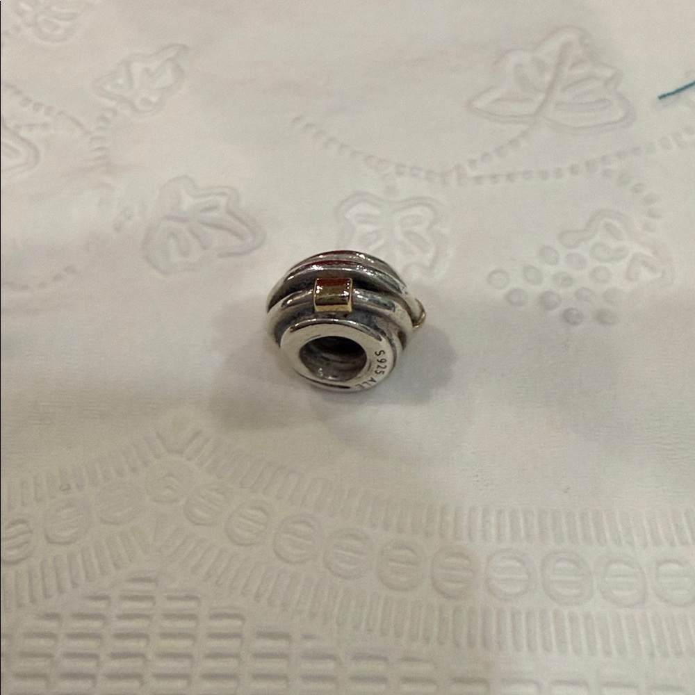 Pandora 14k and 925 sterling silver charm. Retired
